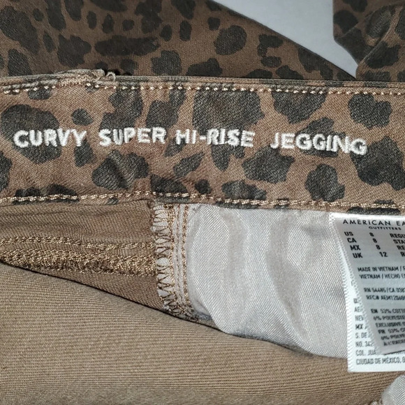 American Eagle Next Level Stretcg Curvy Super Hi-Rise Jegging Leopard Jeans Sz 8 - Picture 12 of 13